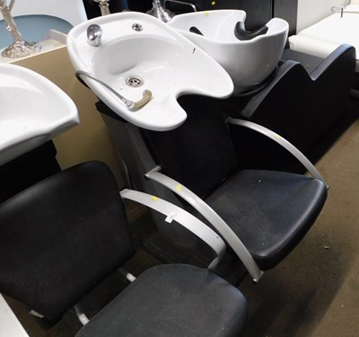 Lot 1204 - Three hair dressing chair and wash basin units.
