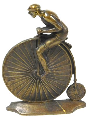 Lot 440 - A brass door stop, modelled as a man riding a...