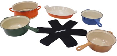 Lot 446 - Three Le Creuset graduated enamel saucepans,...