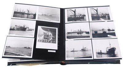 Lot 484 - An album of mid 20thC maritime photographs,...