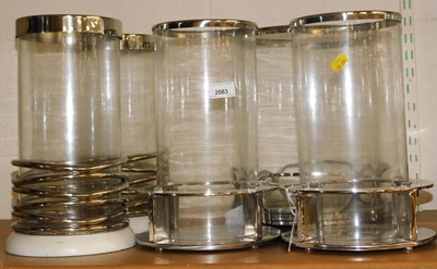 Lot 2083 - A quantity of glass and stainless steel candle...