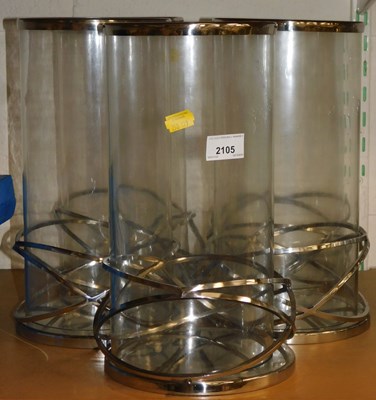 Lot 2105 - A quantity of metal and glass candle holders,...