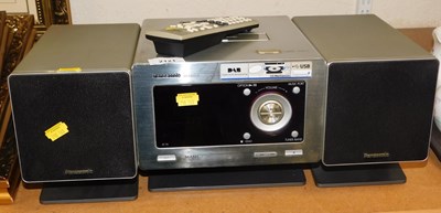 Lot 2121 - A Panasonic CD and docking station, SA-NS55DB,...