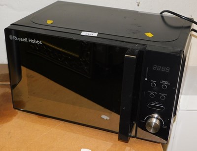 Lot 2124 - A Russell Hobbs microwave, in  black.