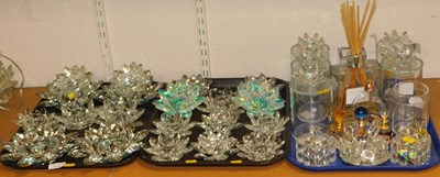 Lot 2132 - A group of faceted glass candle holders, each...