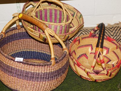 Lot 2145 - A quantity of wicker baskets, together with a...