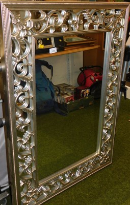 Lot 2153 - A wall mirror, with a rectangular silvered...