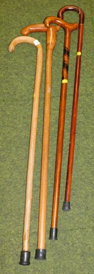 Lot 2167 - Four walking sticks.