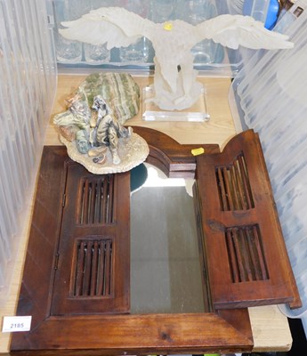 Lot 2185 - A hardwood wall mirror, with slatted doors to...