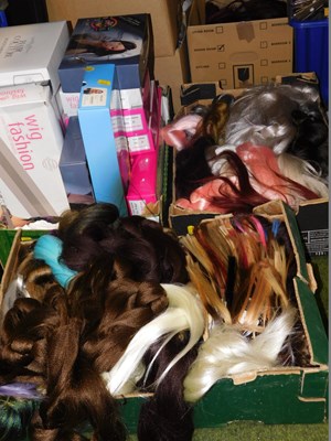 Lot 2219 - A quantity of synthetic hair pieces, colour...