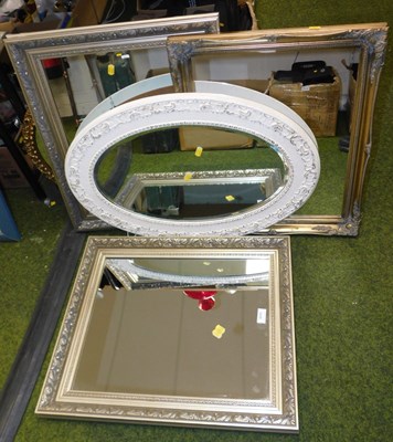 Lot 2235 - A group of wall mirrors, comprising three...