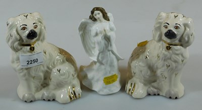 Lot 2250 - Two Royal Doulton pottery spaniels, together...