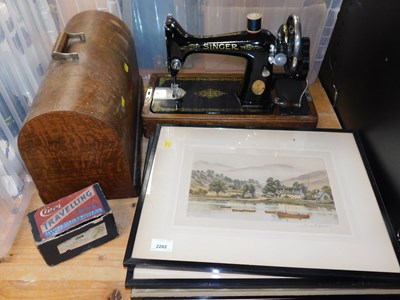 Lot 2282 - A cased Singer sewing machine, together with a...
