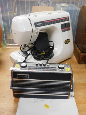 Lot 2283 - A Brother electric sewing machine, together...