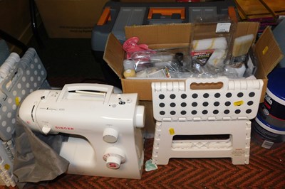 Lot 2293 - A Singer electric sewing machine, together...