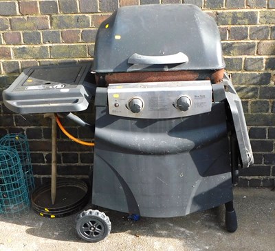 Lot 1218 - A New York two burner gas barbecue, with side...