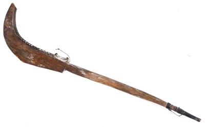 Lot 576 - A Melanesian dance paddle, carved in the form...