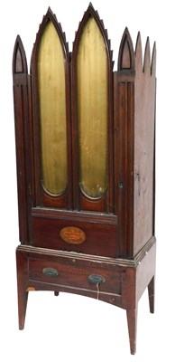 Lot 582 - An early 19thC Gothic style mahogany barrel...