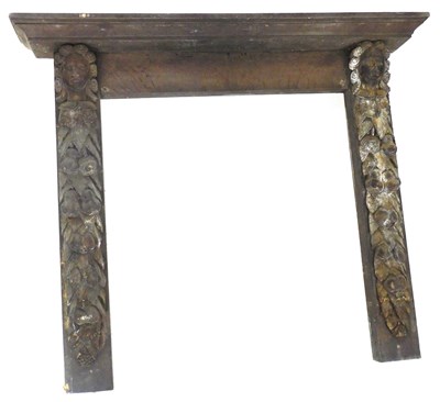 Lot 590 - A late 17thC oak fire surround, the sides with...