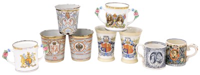 Lot 548 - A George V commemorative Coronation mug,...