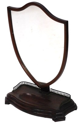Lot 594 - A late Victorian mahogany toilet mirror, with...