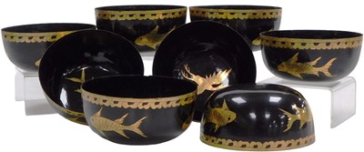 Lot 550 - A set of eight  Asian black lacquer and gilt...
