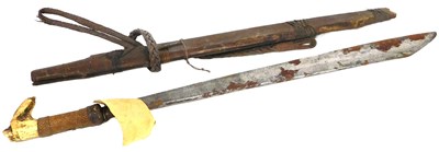 Lot 554 - An Indonesian Mandau sword, with a bone grip,...
