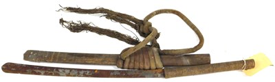 Lot 559 - A Burmese or Thai dha, with a rope bound grip...