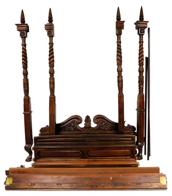 Lot 616 - A cherry wood double four poster bed, with...