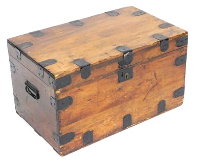 Lot 617 - An early 20thC pine chest, with cast iron...