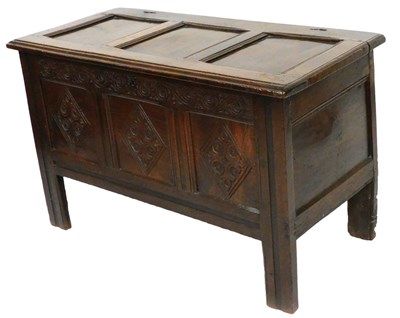 Lot 618 - An 18thC coffer, with a triple panelled lid...