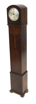 Lot 623 - An Art Deco oak cased grandmother clock,...