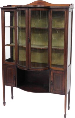 Lot 625 - An Edwardian mahogany breakfront display...
