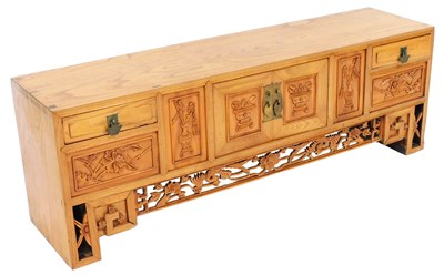 Lot 640 - A Quing Dynasty Chinese elm low table cabinet,...