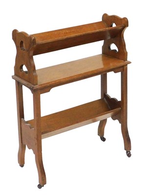 Lot 642 - A Victorian Arts & Crafts style oak book...