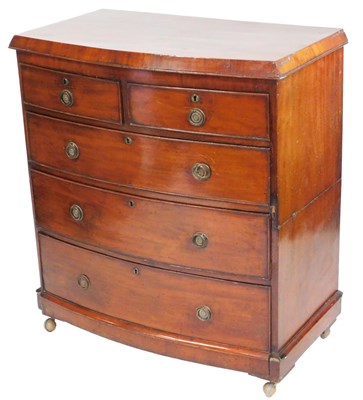 Lot 673 - A Victorian mahogany bowfront chest, of two...