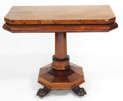 Lot 675 - A Regency rosewood foldover tea table, raised...