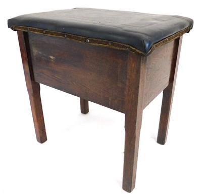 Lot 647 - An early 20thC oak sewing box, with a black...