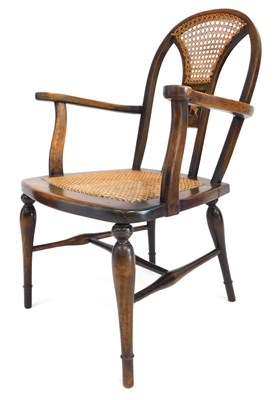 Lot 683 - An early 20thC beech carver chair, with a...