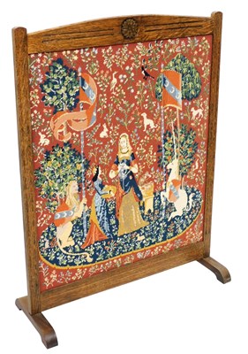 Lot 687 - An early 20thC oak firescreen, with a Lady and...