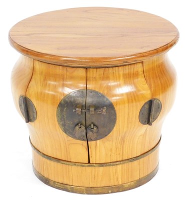 Lot 650 - A Chinese elm drum food container, of barrel...