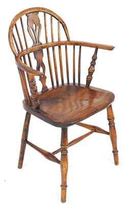 Lot 690 - A 19thC oak and elm Windsor chair, with a vase...