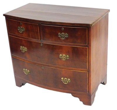 Lot 652 - An Edwardian mahogany bow front chest, of two...