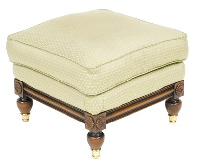 Lot 658 - A Georgian style oak stool, upholstered in...
