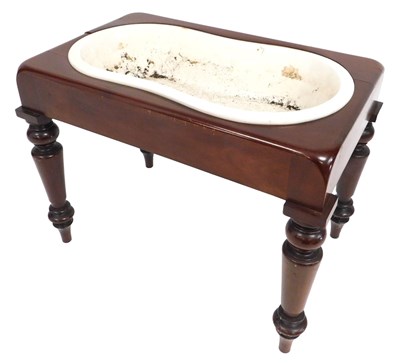 Lot 662 - A Victorian mahogany comode, with a ceramic...