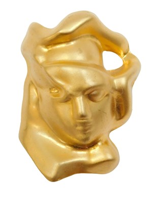 Lot 247 - An Eau du Soir brushed gold coloured multi...