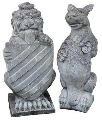 Lot 731 - A pair of reconstituted stone heraldic garden...