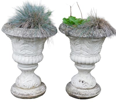Lot 733 - A pair of partially cream painted concrete...
