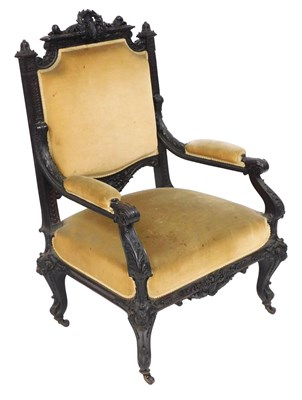 Lot 705 - A late 19thC French carved oak armchair, the...