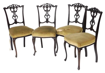 Lot 706 - A set of four Victorian rosewood dining chairs,...